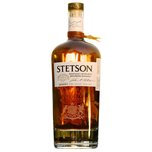 Bottle of Stetson Kentucky Straight Bourbon Whiskey with a gold cap and Western-styled label showing amber bourbon inside