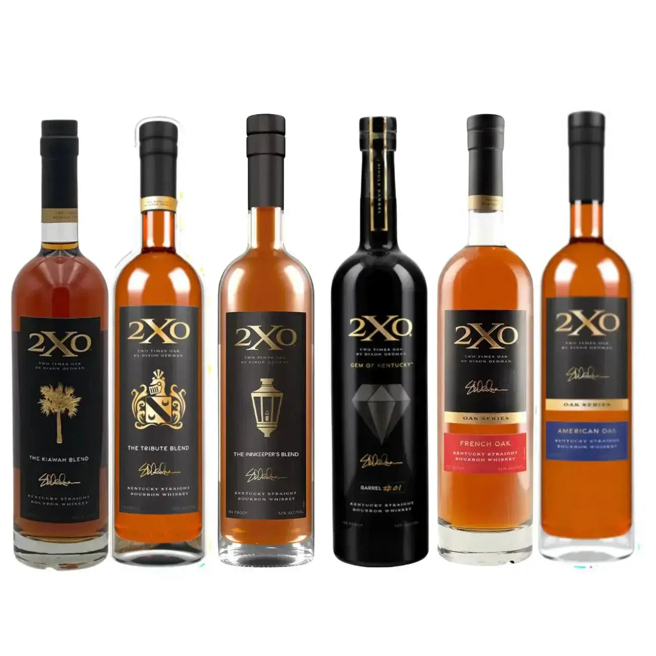 Six bottles of 2XO whiskey are lined up side by side, each with a distinct label and design, featuring various blends including The Kiawah Blend, The Tribute Blend, and others.