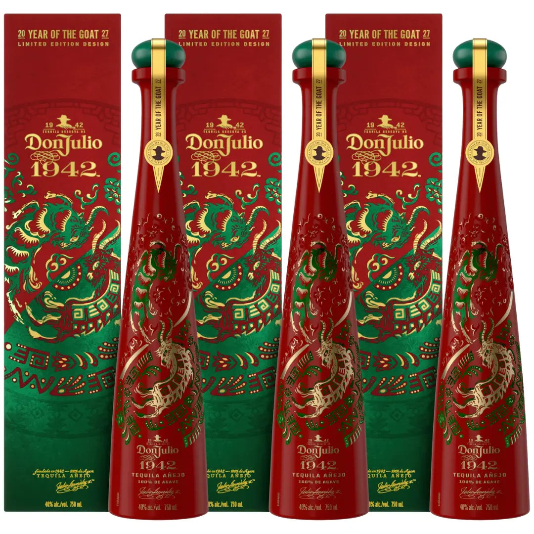 Three Don Julio 1942 Tequila Anejo Year of the Goat 2027 Limited Edition bottles, featuring green and gold dragon designs, stand before matching boxes—a striking collectible from Don Julio Tequila for this festive celebration.