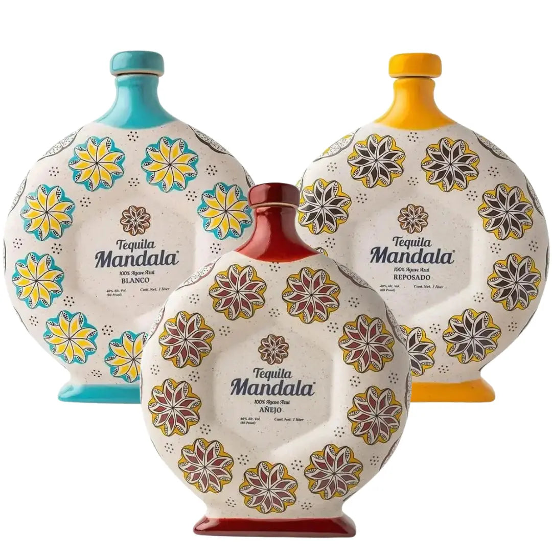 Three round, decorative Mandala Blanco, Reposado &amp; Añejo Tequila bottles featuring floral mandala patterns, with stoppers in teal, yellow, and red.