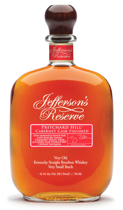 A bottle of Jefferson’s Pritchard Hill Cabernet Cask Finished whiskey by Jefferson’s, with a red and white label featuring gold script on clear glass filled with amber liquid.