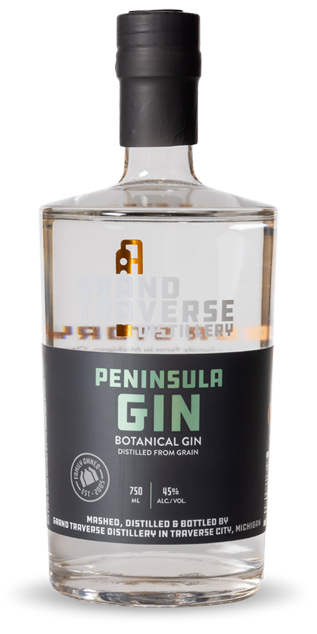 Grand Traverse Distillery Peninsula Gin is a 750 ml clear glass bottle of botanical gin at 45% ABV, distilled and bottled in Traverse City, Michigan—ideal for craft gin enthusiasts.