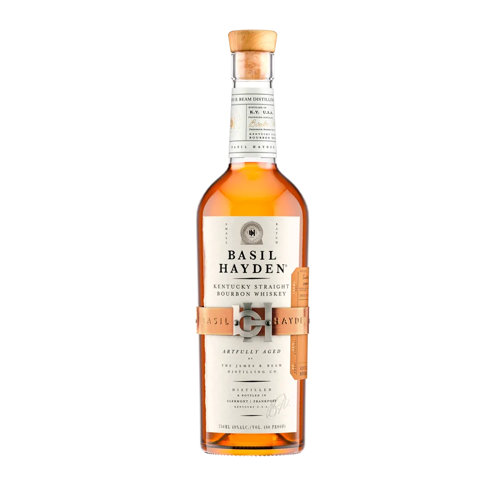 A bottle of Basil Hayden's Kentucky Straight Bourbon Whiskey from Basil Hayden's, featuring a tan label with copper accents and amber liquid, stands upright against a plain white background.