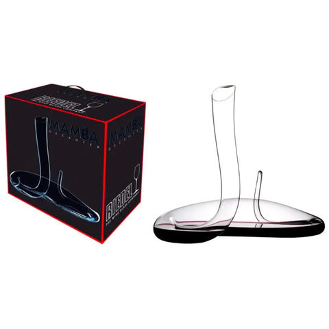 Riedel Wine Decanter Mamba, featuring a distinctive curved crystal design for optimal wine aeration, is shown alongside its black packaging box labeled "Mamba Decanter" with an illustration of this elegant decanter on the side.