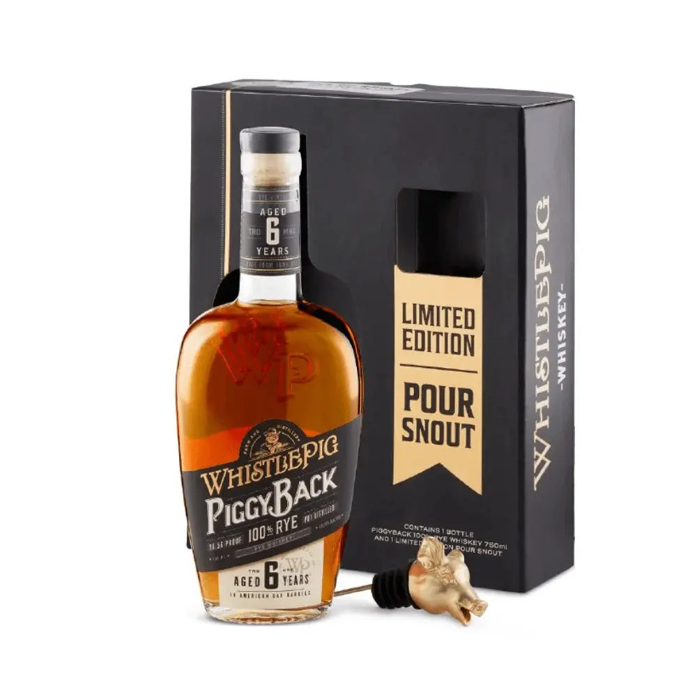 A bottle of WhistlePig PiggyBack Pig Pour Kit - Pigstop 6 Year Rye Whiskey from WhistlePig is displayed beside its sleek black box, featuring Limited Edition Pour Snout branding. This distinctive rye whiskey gift set comes with a decorative pig-shaped pour spout showcased in front of the packaging.