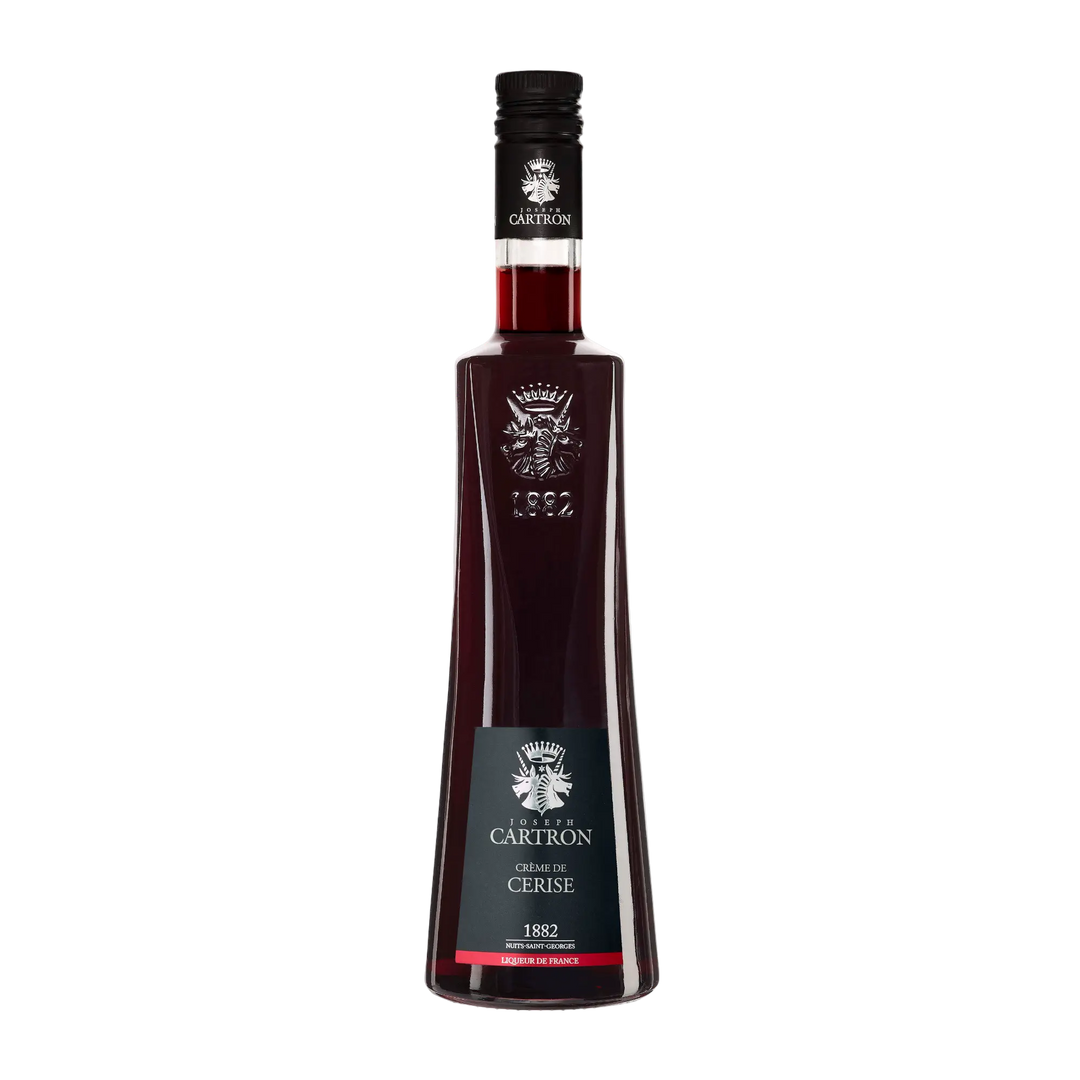 A 700 ml bottle of Cartron Crème de Cerise (Cherry) Liqueur features a black cap, embossed logo, tall glass bottle, and dark red liquid. The front label displays the Cartron brand name and product details.