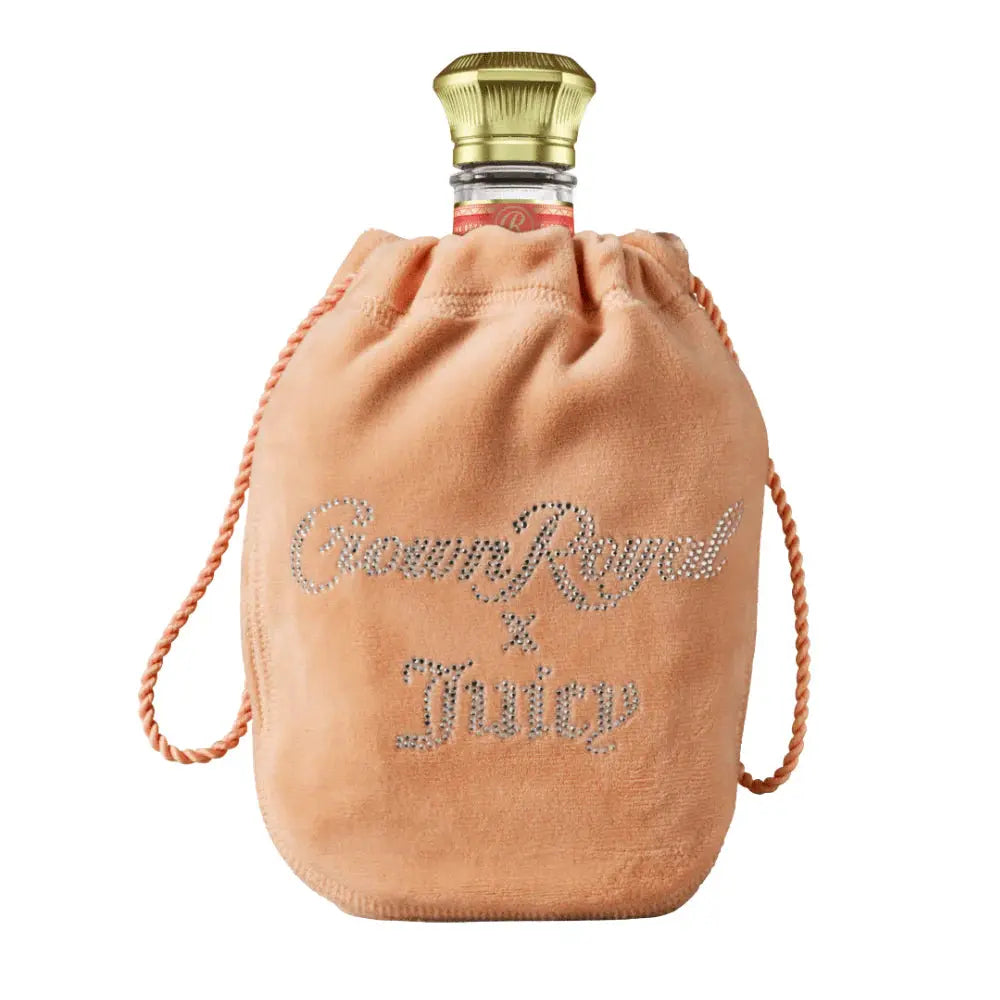 The Crown Royal Peach X Juicy Couture limited edition features a gold-capped bottle in a peach velvet pouch with “Crown Royal x Juicy” in rhinestones—a special release from Crown Royal.