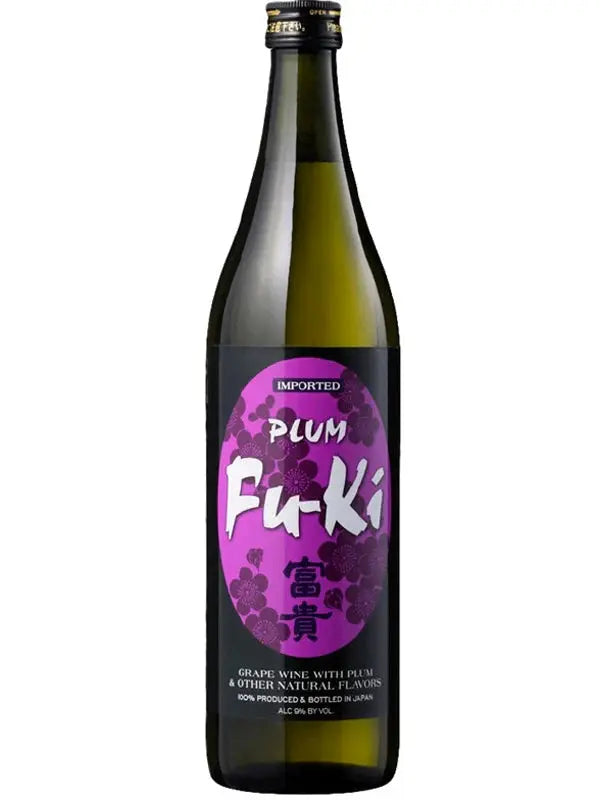 A bottle of Fu-Ki Plum Sake features a purple label adorned with the Fu-Ki Sake brand name and elegant floral designs. The label highlights that this is a Japanese plum sake—grape wine expertly blended with plum and natural flavors, produced and bottled in Japan for a sweet, fruit-forward beverage experience.