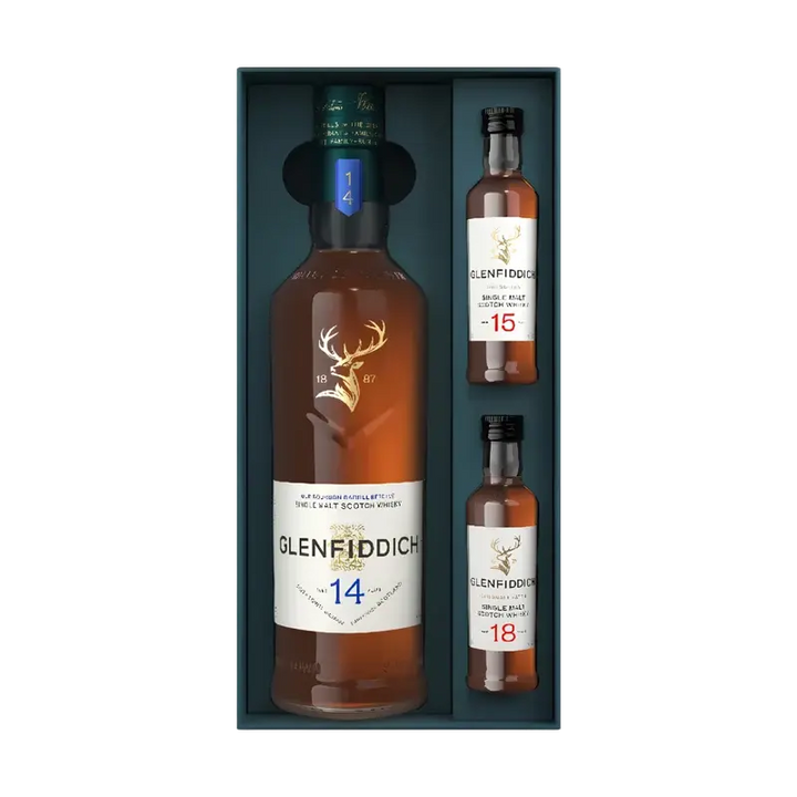A Glenfiddich 14 Year Single Malt Scotch Whisky Limited Edition Gift Set with 15 &amp; 18 Year 50mL containing one full-sized bottle and two miniature bottles of scotch whisky.