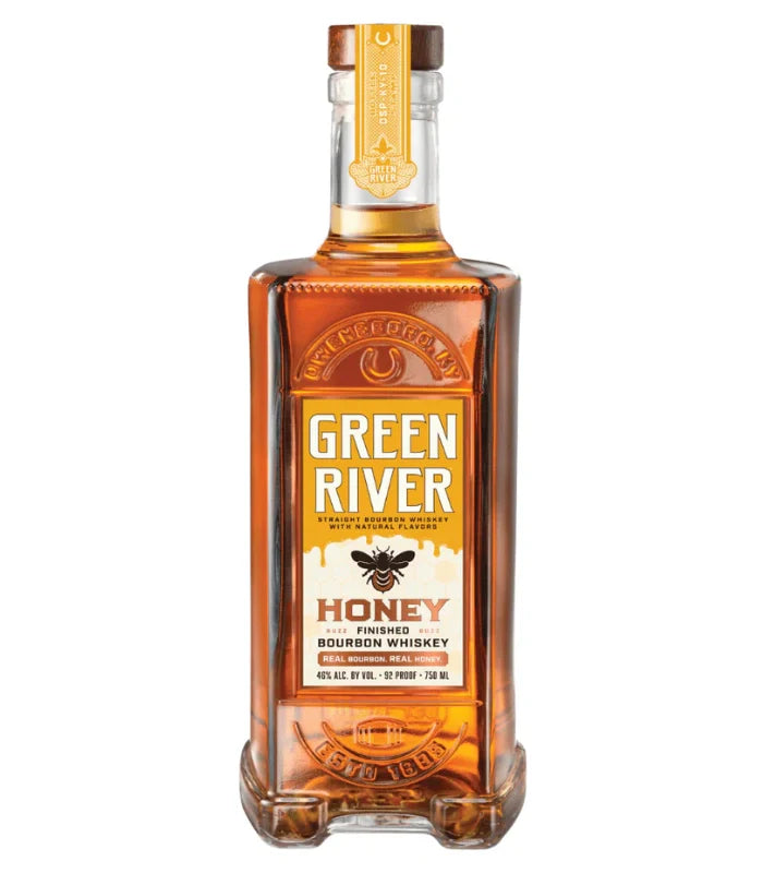 A bottle of Green River Honey Finished Bourbon Whiskey from Green River, featuring an amber hue, a yellow and white label with a bee graphic, gold cap, and product details including alcohol content.