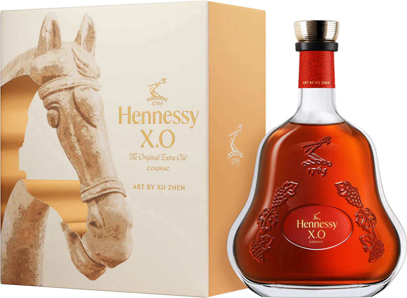 A bottle of Hennessy Cognac X.O Lunar New Year 2026 Limited Edition Art by Xu Zhen, with a red cap, sits next to its box featuring a horse head sculpture and gold lettering; the sculpted bottle holds rich amber cognac.