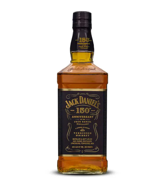 A bottle of Jack Daniel’s 150th Anniversary Tennessee Whiskey 86 Proof 750mL, featuring a black and gold label and square shape, stands out with its amber liquid against a plain white background.