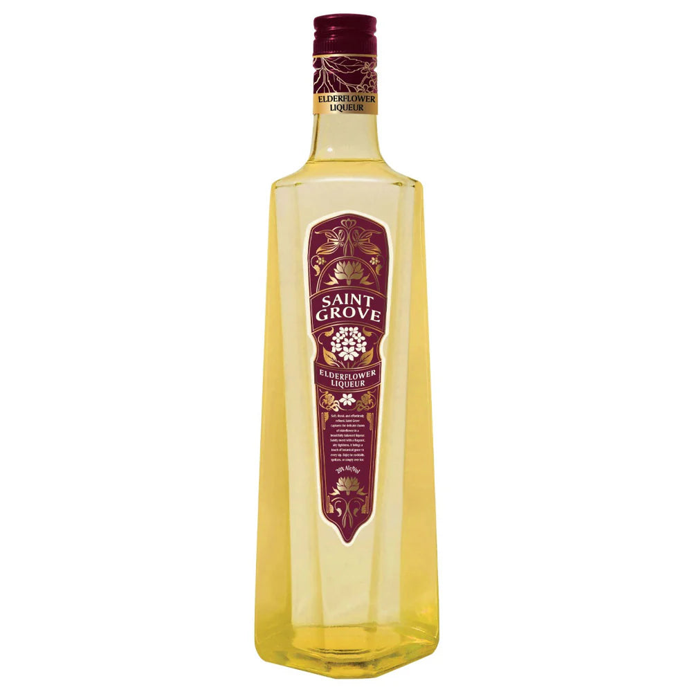 A tall, hexagonal bottle of Saint Grove Elderflower Liqueur with gold-yellow liquid and a maroon and gold label is displayed against a white background—an elegant cocktail ingredient from Saint Grove.