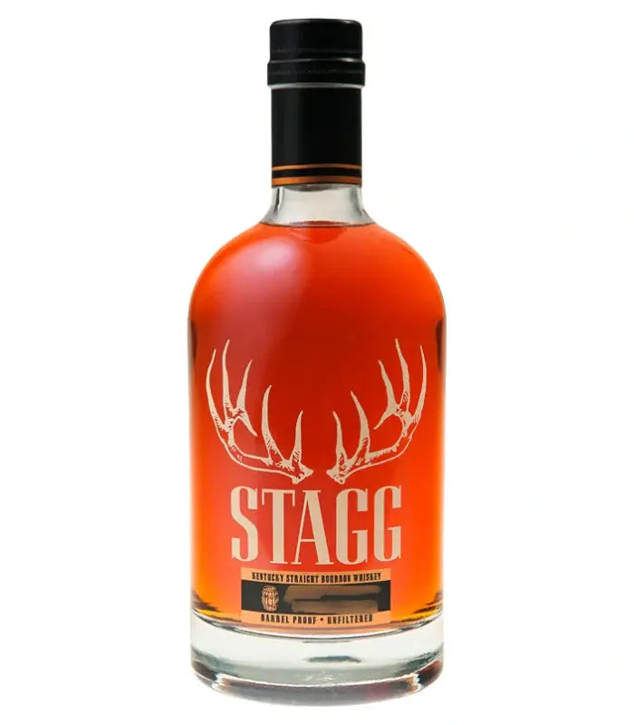 A bottle of Stagg Kentucky Straight Bourbon Whiskey Batch 26A 129.3 Proof from Buffalo Trace, featuring a clear label with white antler graphics, bold "STAGG" text, amber bourbon inside, and finished with a black cap.