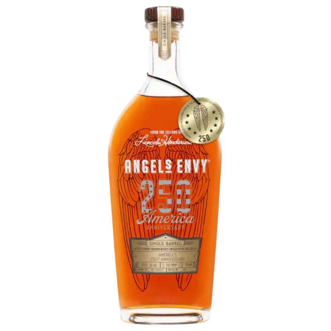 A collectible bottle of Angel's Envy Single Barrel America’s 250th Anniversary Bourbon features golden angel wings on the glass, a round gold neck tag, and showcases the amber whiskey inside.