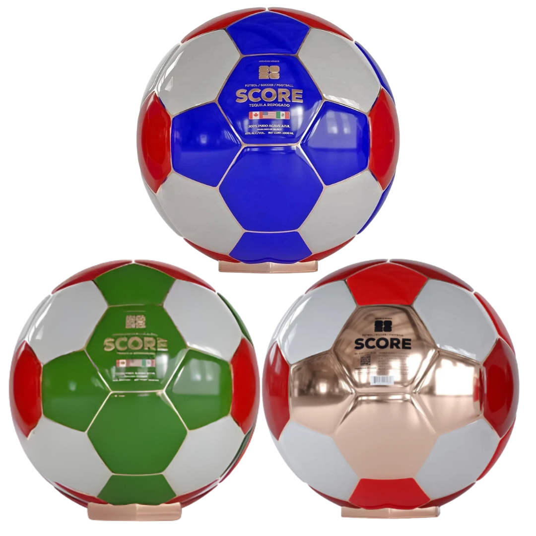 Three soccer balls—blue/red, green/red, and bronze/white—each say SCORE, inspired by the Score Tequila Reposado 2026 World Cup USA, Mexico & Canada Limited Edition Soccer Ball Bundle from Score Tequila.