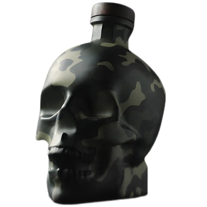 The Crystal Head Vodka Camo Veteran Tribute Limited Edition features a skull-shaped bottle with a camouflage pattern and dark cap—an ideal collectible from Crystal Head Vodka.