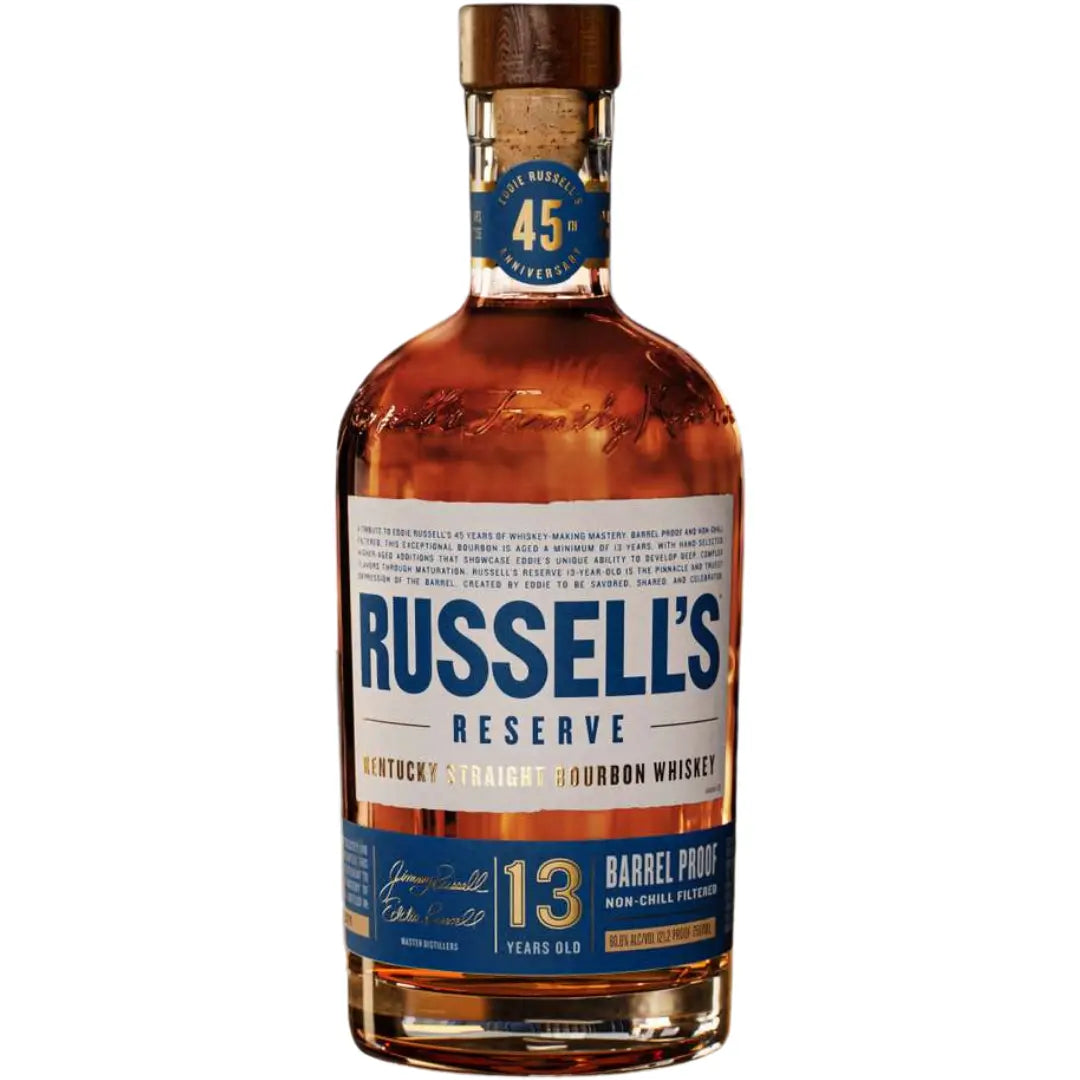 A bottle of Russell’s Reserve 13 Year Eddie’s 45th Anniversary Bourbon, barrel proof, featuring a blue and gold label with product details and a blue neck label marked “45%.”.