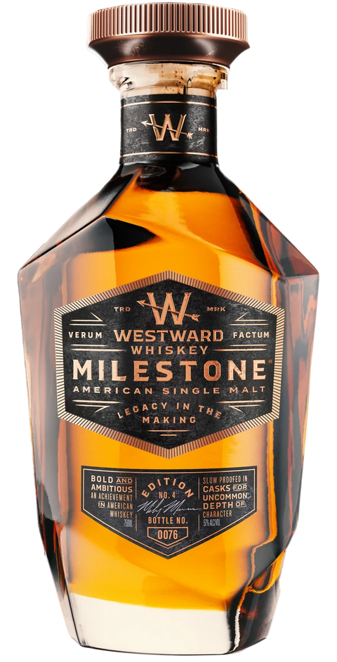 A bottle of Westward Whiskey Milestone Edition No. 4 American Single Malt (Pre-Order), a limited release from Westward, features a striking geometric design with amber liquid visible inside and showcases detailed labeling along with signature Westward branding.
