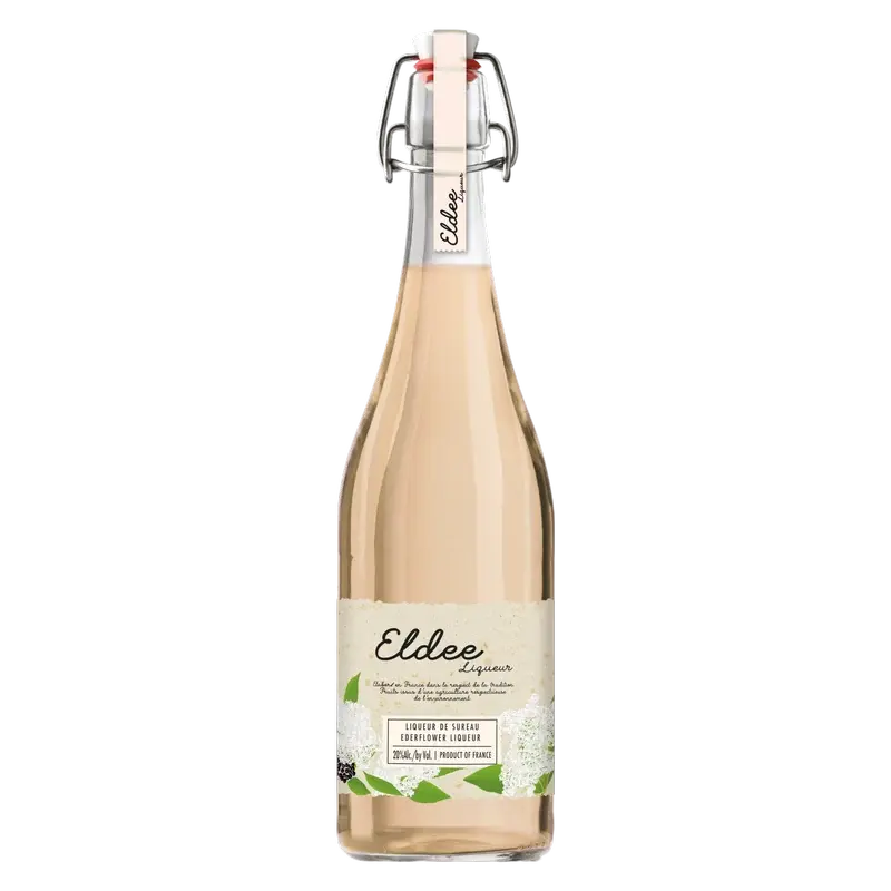 A clear glass bottle of Eldee Elderflower Liqueur, featuring a pale pink hue, a swing-top closure, and a label with a botanical illustration of elderflowers.