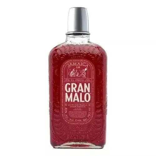 A clear 750ml bottle of Gran Malo Jamaica Flavored Tequila (PRE-ORDER) filled with vibrant red liquid, topped with a silver cap and adorned with a detailed white label. This distinctive tequila from Gran Malo is expertly infused to deliver the bold, authentic taste of hibiscus, offering a captivating twist on traditional Mexican tequila.