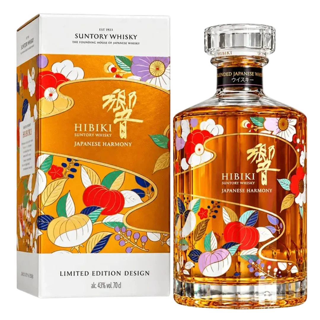 A bottle of Hibiki Japanese Harmony Chiso 2026 Limited Edition Blended Japanese Whisky 750mL and its box, both featuring a gold-toned label with colorful botanical illustrations of flowers and fruit.