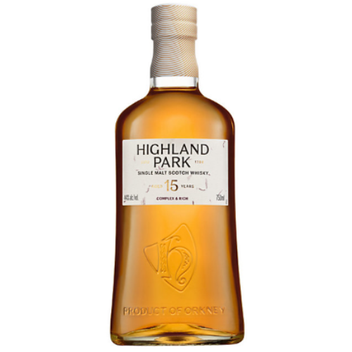 A clear glass bottle of Highland Park 15 Year Old single malt Scotch whisky features a light brown label and embossed logo; matured in ex-Oloroso sherry casks, the amber spirit glows within.