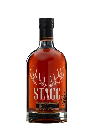 A bottle of Buffalo Trace Stagg Sazerac Barrel Select 124.0 Proof bourbon whiskey with a black cap, amber liquid, and a label displaying white antlers above the bold "STAGG" lettering.