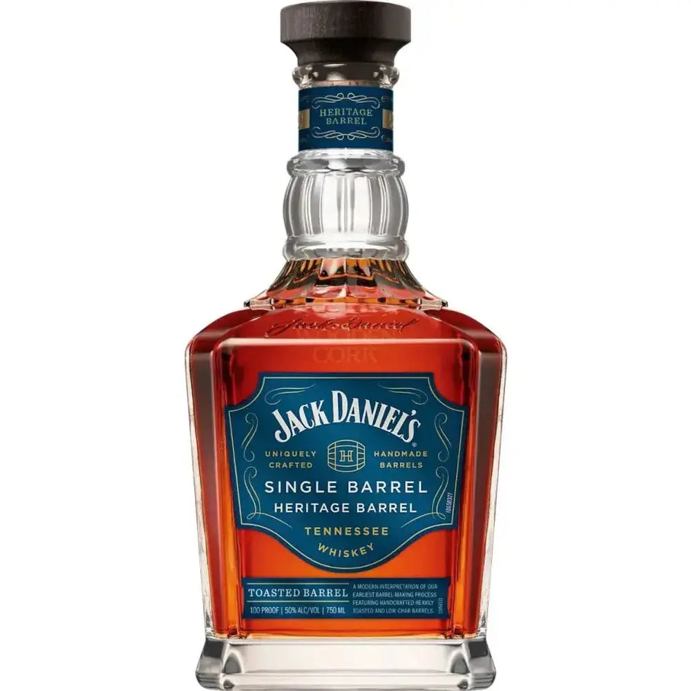 A 750mL bottle of Jack Daniel’s Heritage Toasted Single Barrel 2025 Release with a blue and copper label, clear glass, and a wooden-topped cork. The amber Tennessee whiskey is expertly crafted in toasted oak barrels.