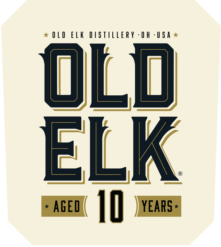 Featuring the distinguished Old Elk Bourbon label with striking "OLD ELK" lettering and “Aged 10 Years” beneath, this design highlights the remarkable Old Elk 10 Year Straight Wheat Whiskey. Prominently displayed at the top is "Old Elk Distillery · OH · USA." The cream background, accented with rich dark and gold tones, provides an elegant backdrop that honors the heritage and premium craftsmanship behind this finely aged wheat whiskey.