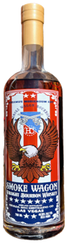 A 750ml bottle of Smoke Wagon Red White and Blue 2026 Straight Bourbon Whiskey with a vibrant eagle and American flag label plus gold cap—a striking limited edition from Smoke Wagon Bourbon. Pre-order now!.