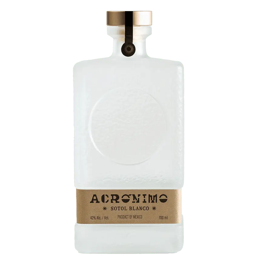 Acronimo Sotol Blanco 700ml features a rectangular, frosted glass bottle with a gold cap and base label, showcasing the artisanal elegance of this clear Mexican sotol.